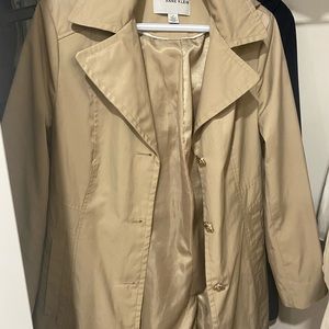 Trench coat barely used. Gold detailing.